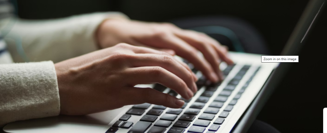 Person using laptop photo